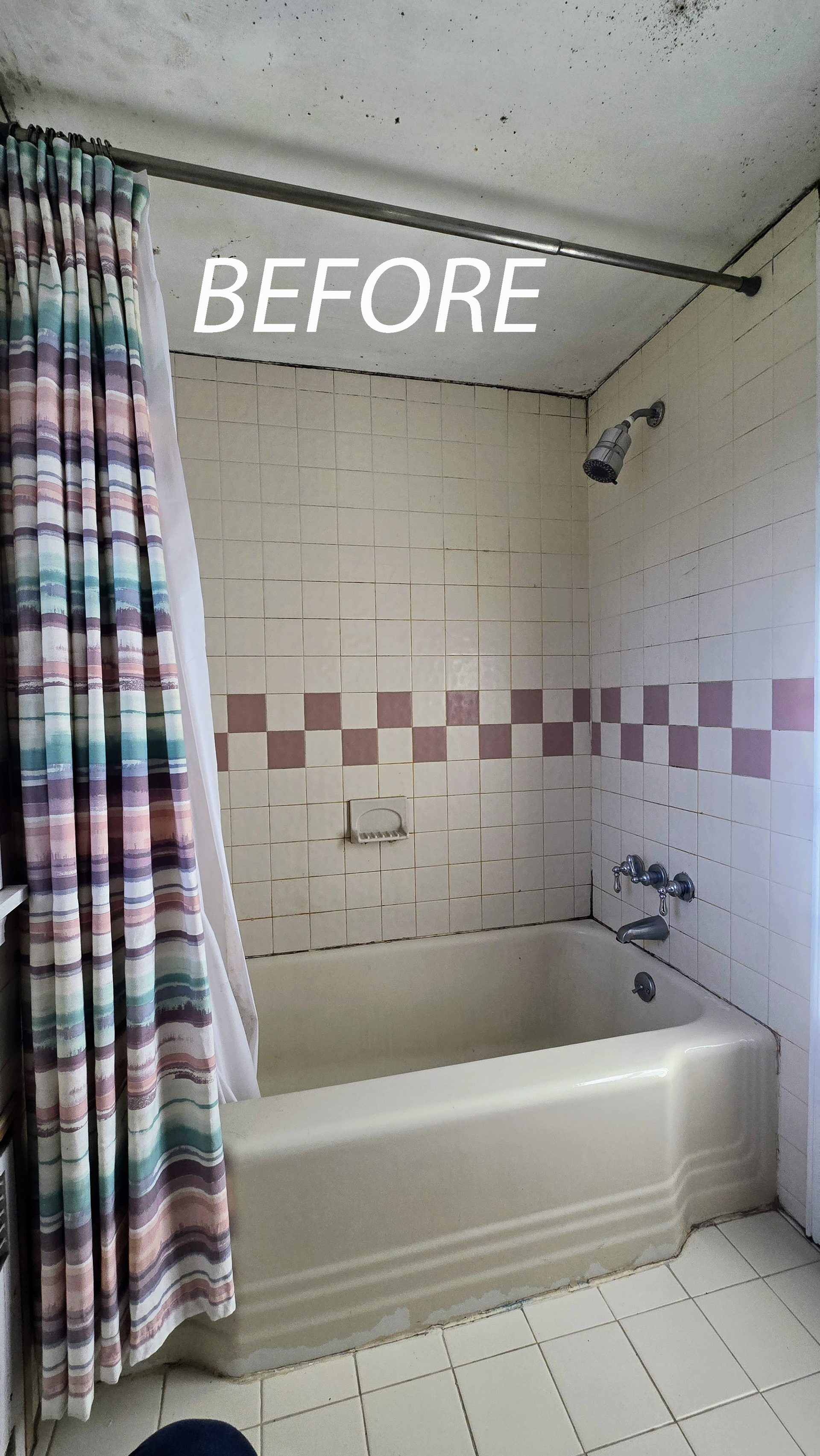 Before photo of a bathroom in Plantsville, CT with white tile, pink accents, and a tub with a patterned shower curtain.