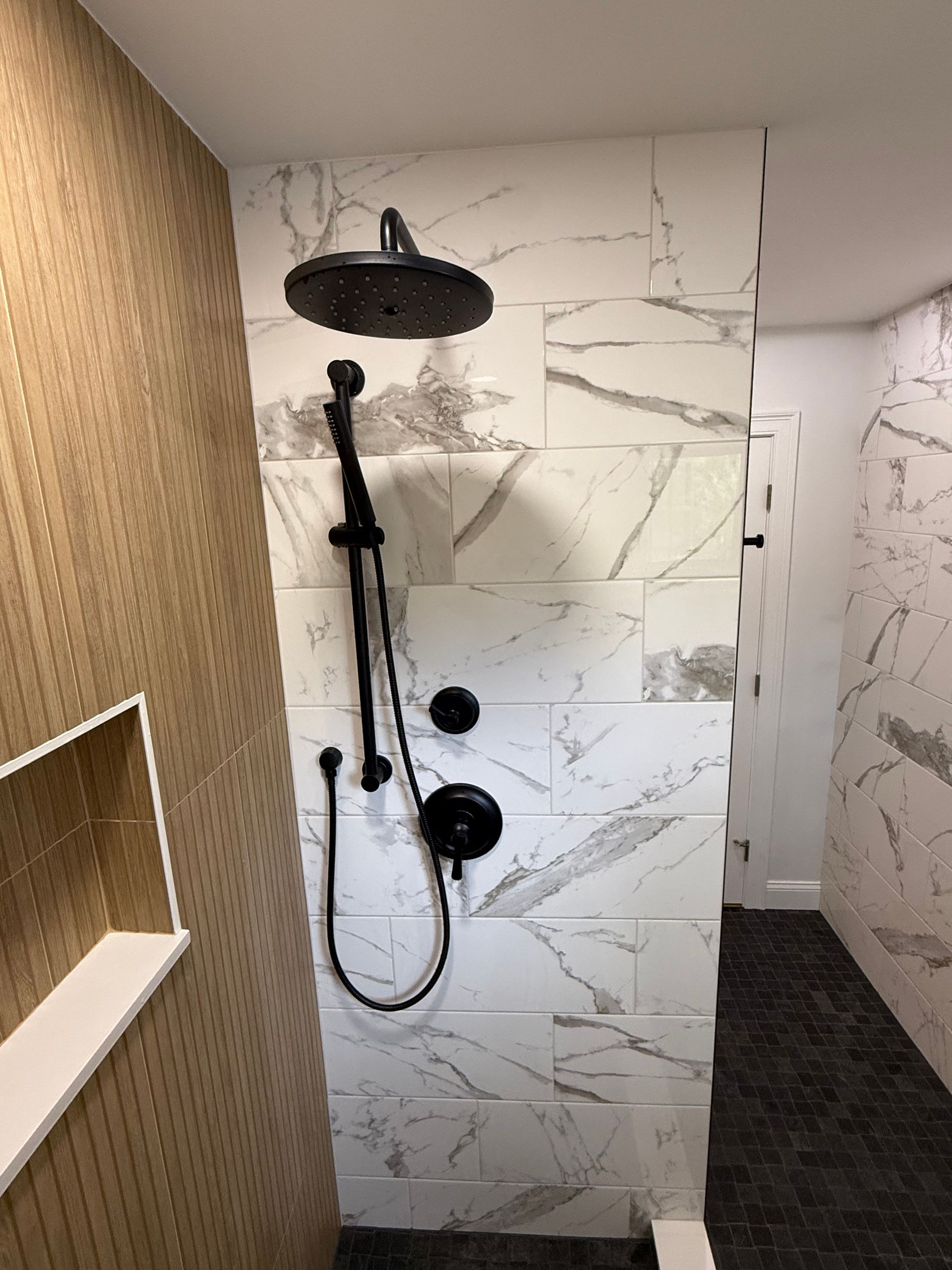 A bathroom with a red jacuzzi tub in the corner