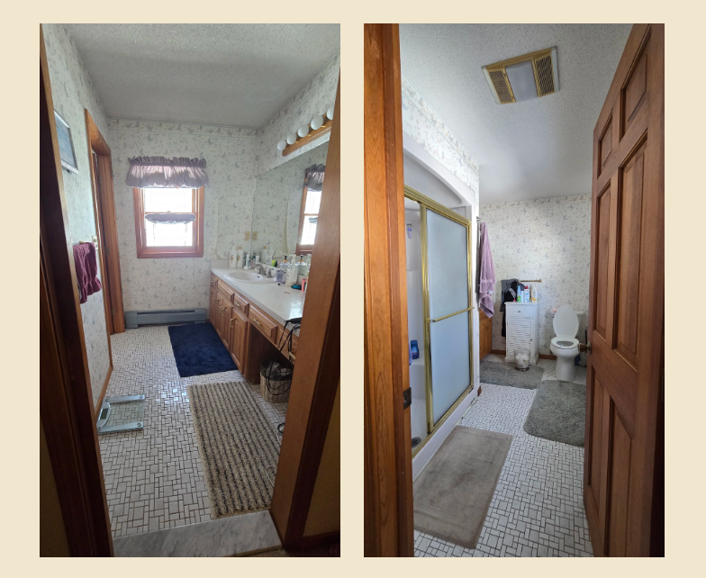 Bristol Bathroom with double sinks, lit mirror, wooden cabinets, and window.