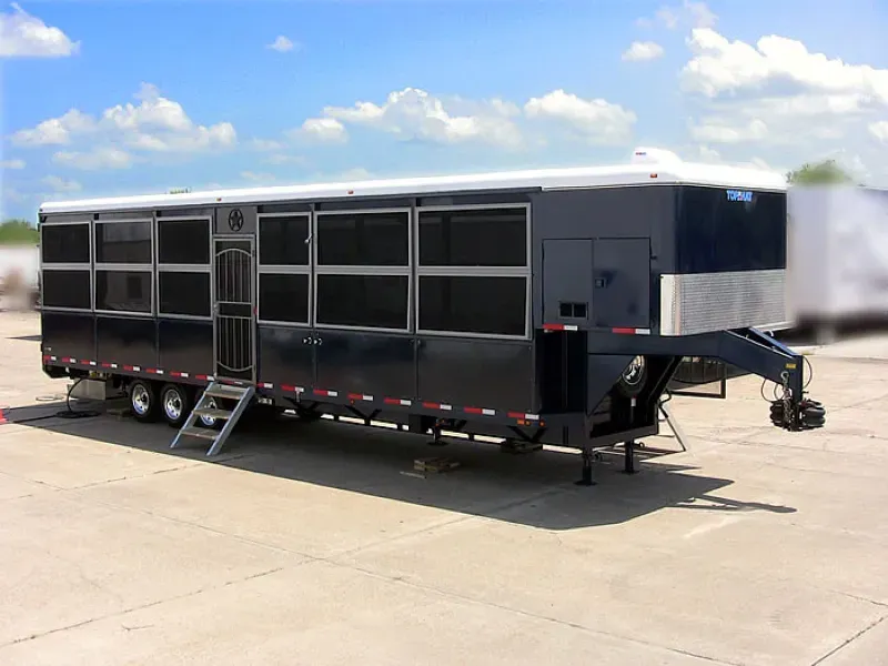 A large trailer is parked in a parking lot.
