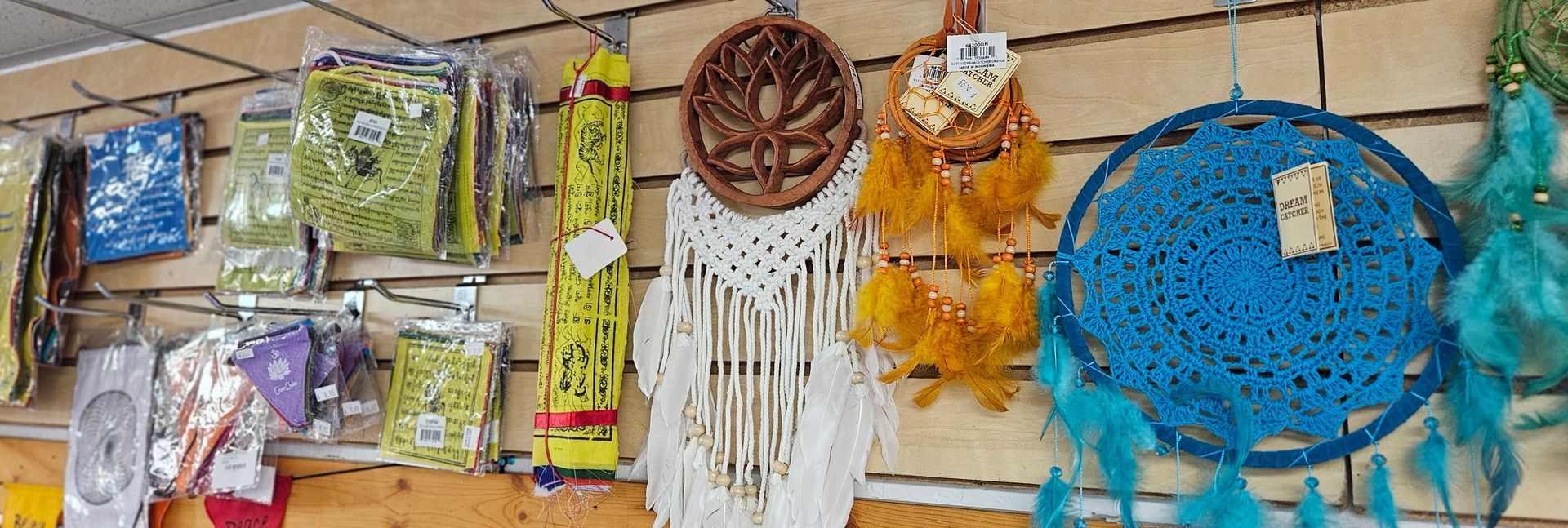 Colorful prayer flags and dream catchers on display.