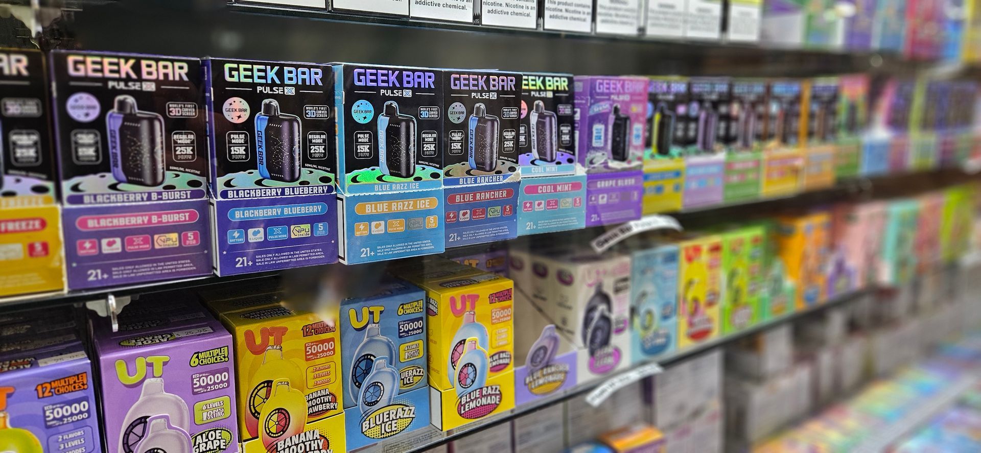 A case of disposable vapes like Geek Bar and UT brand mods.