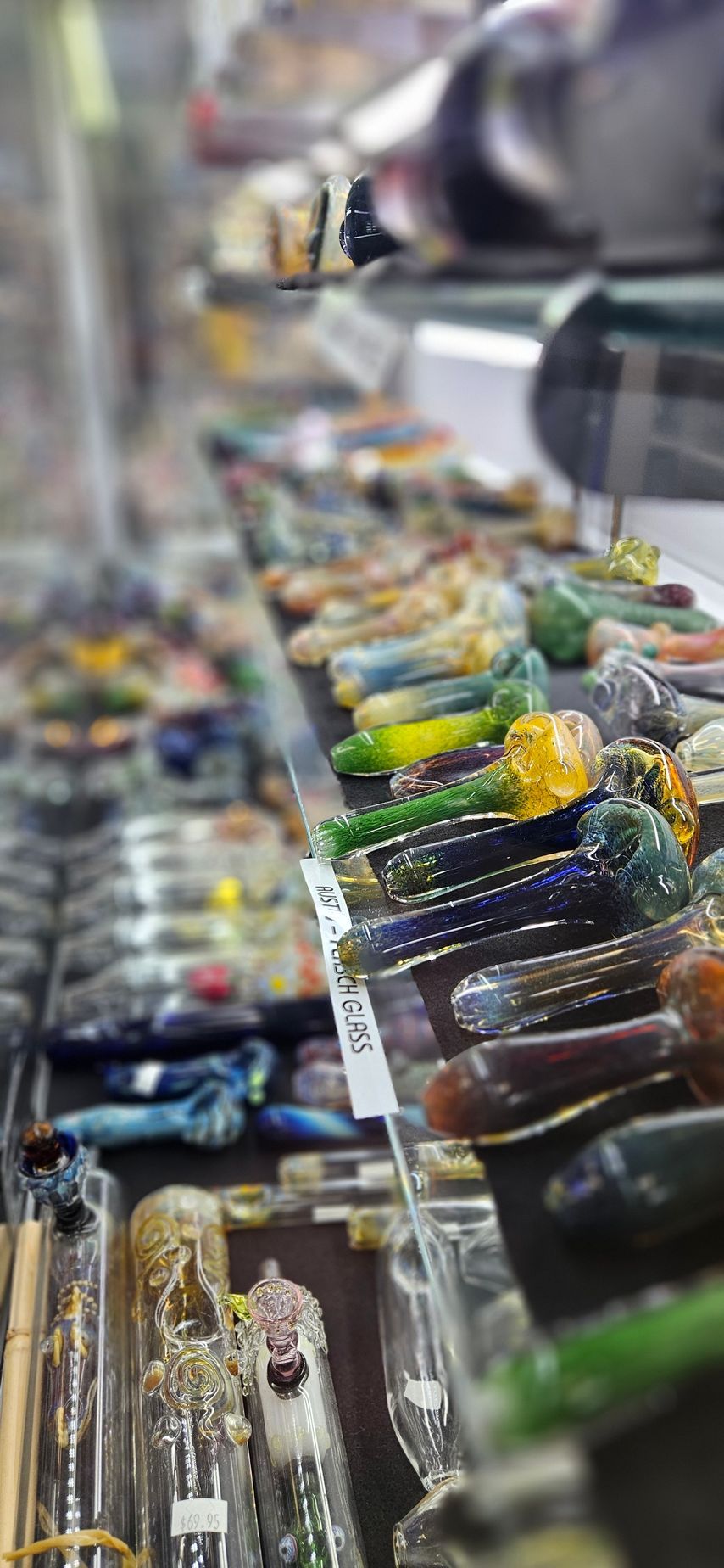 Several beautiful glass pipes that were hand blown by local artist.