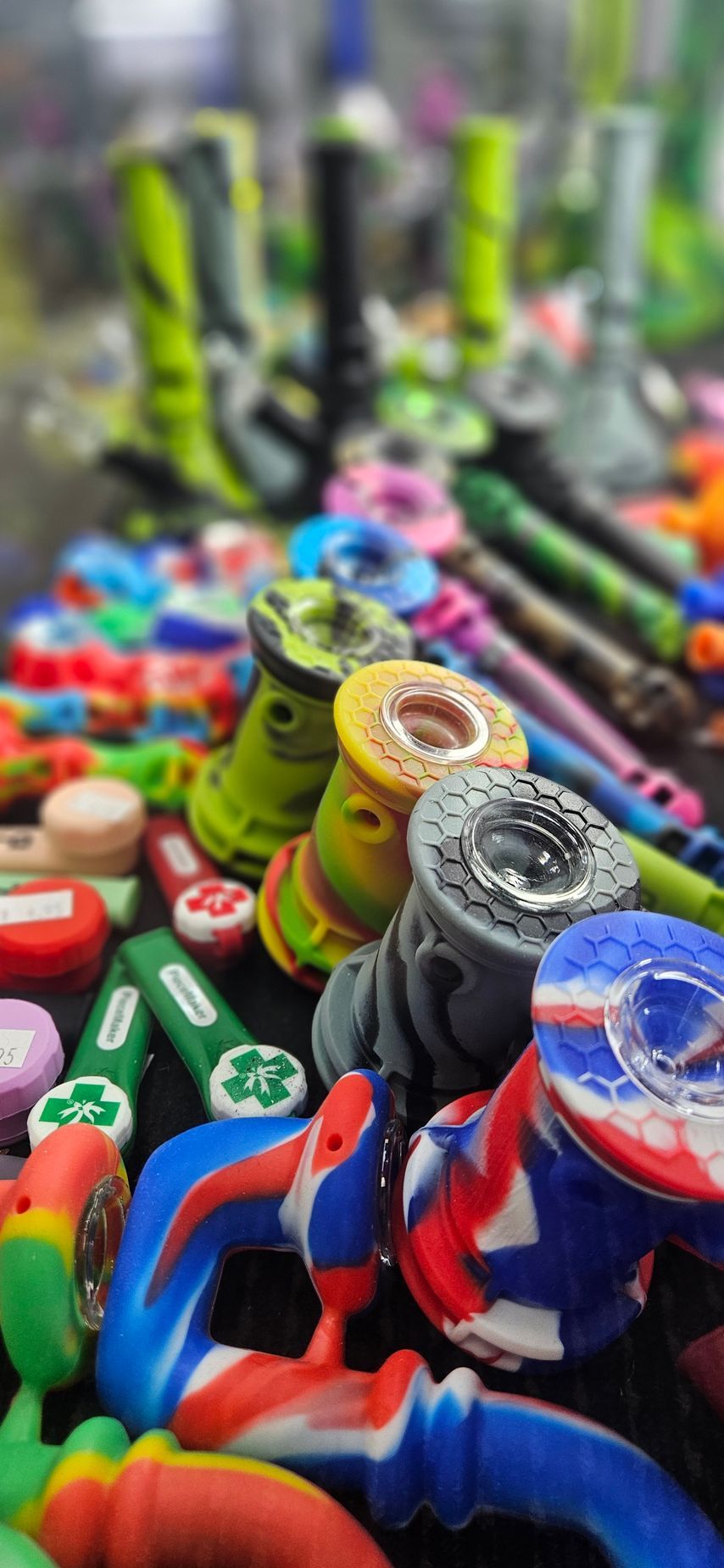 A variety of silicone smoking apparatuses like pipes, bongs, dab rigs and steam rollers.