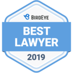 a blue and white badge that says `` best lawyer '' .