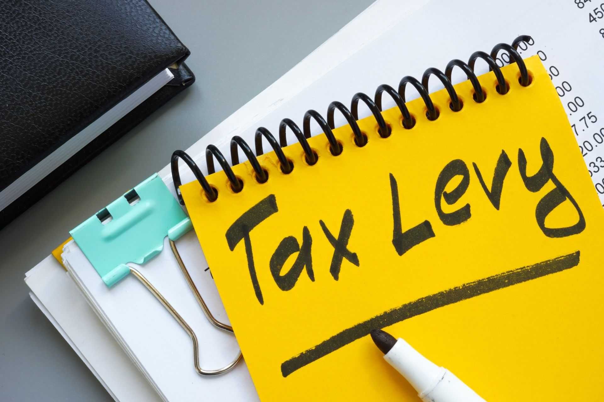 What is a tax levy, and how does a state levy tax work