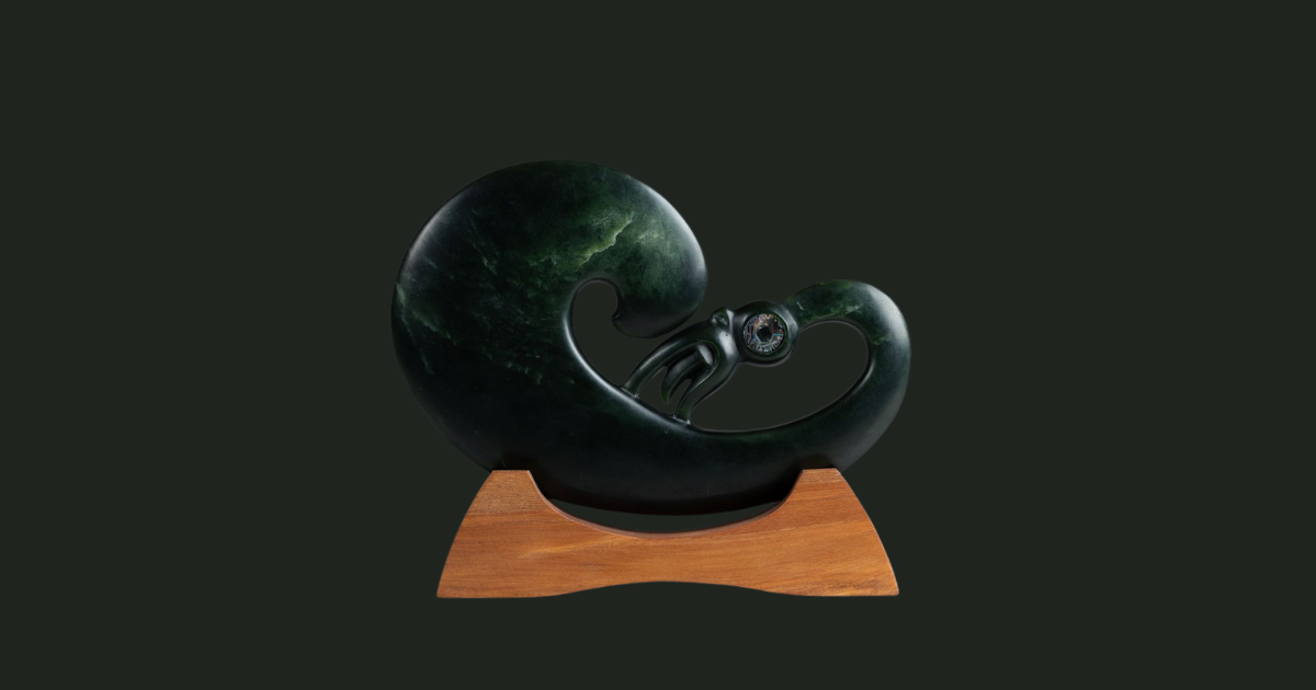 corporate gifting with pounamu - Manaia sculpture on wooden stand