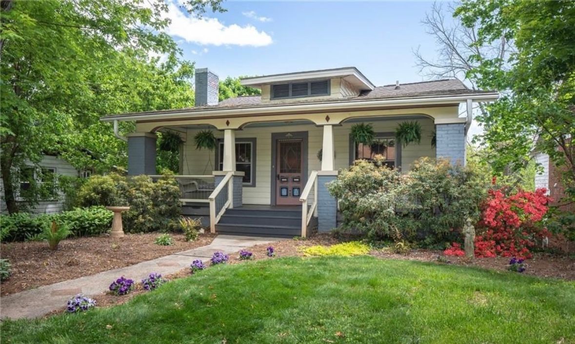 Craftsman home with outdoor landscaping