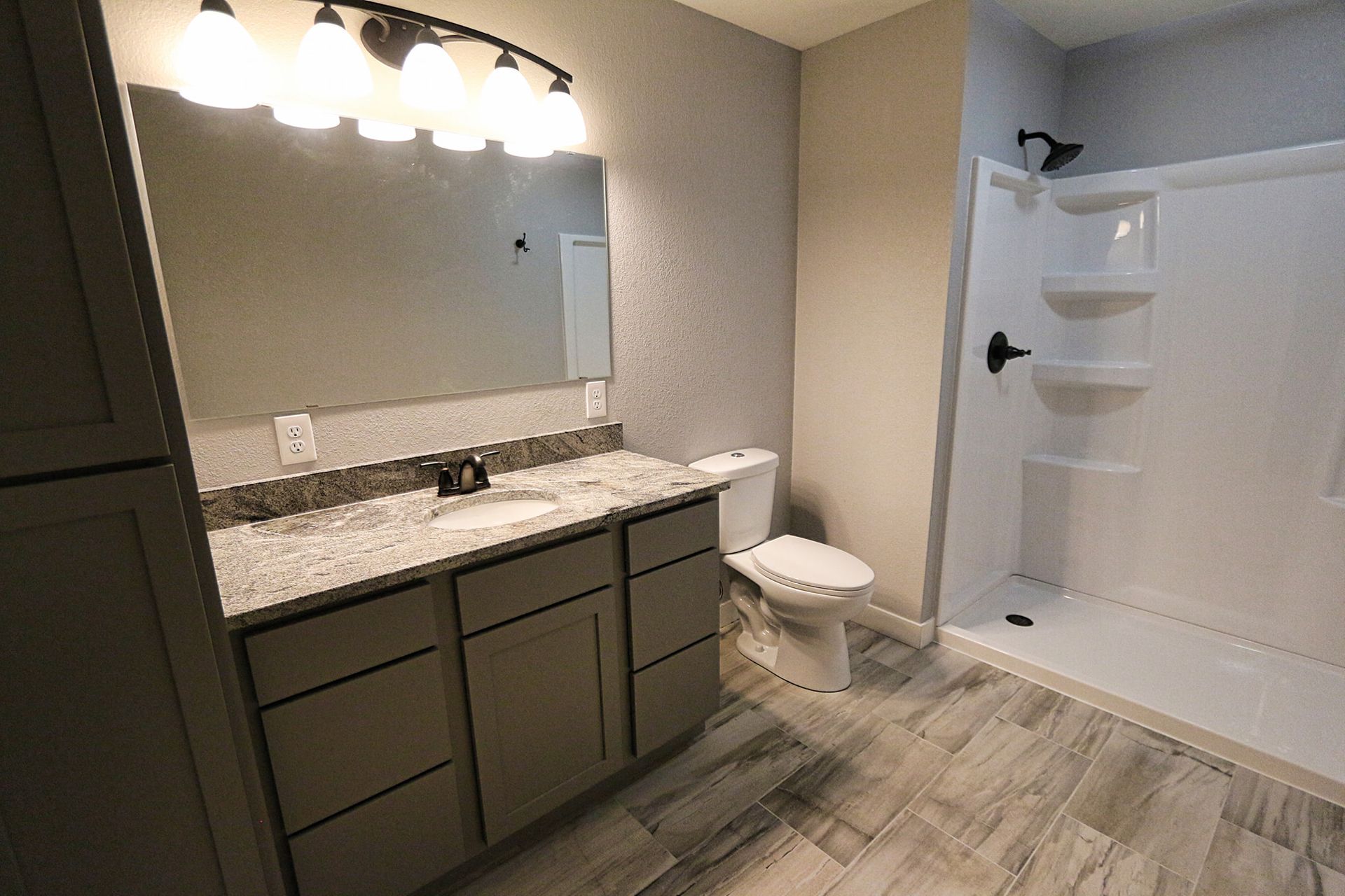 Bathroom Vanity Mirror – Decorah, IA – Viking Roofing & Construction