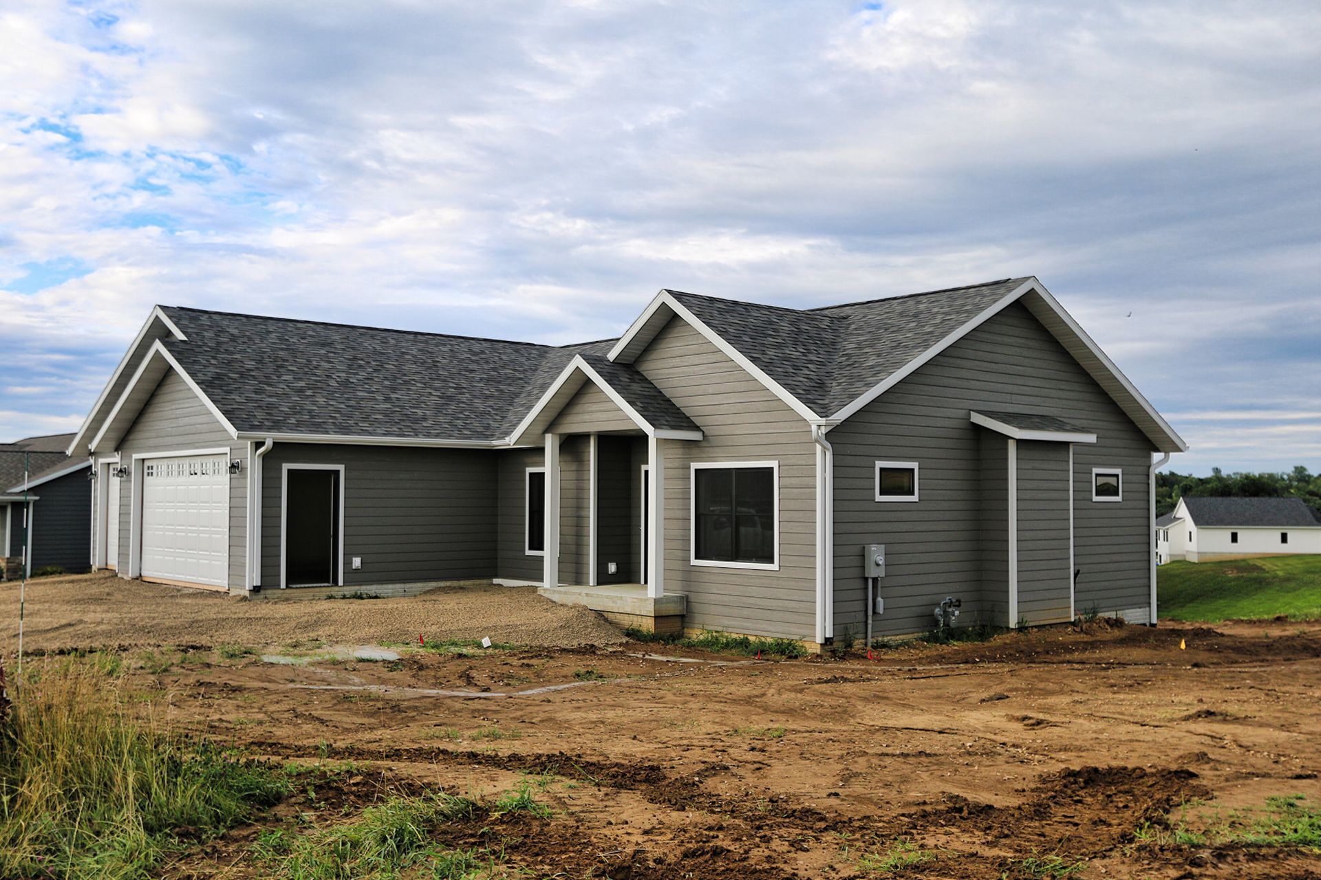 Empty Residential Lawn – Decorah, IA – Viking Roofing & Construction