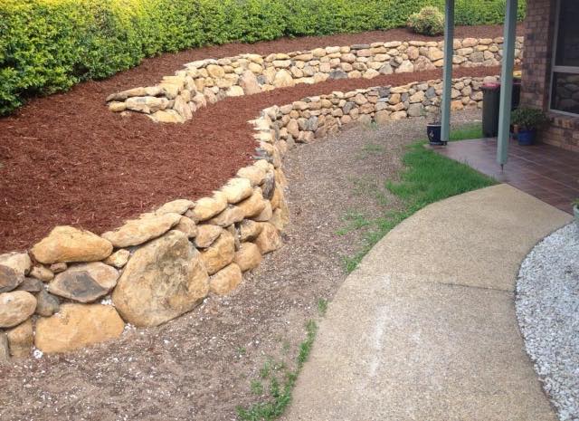 Retaining Wall With Soil For Plants — Retaining Wall Builders in Northern Rivers, NSW