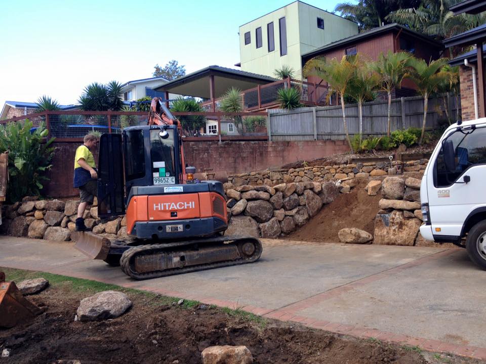 Rock Wall Being Built — Retaining Wall Builders in Northern Rivers, NSW