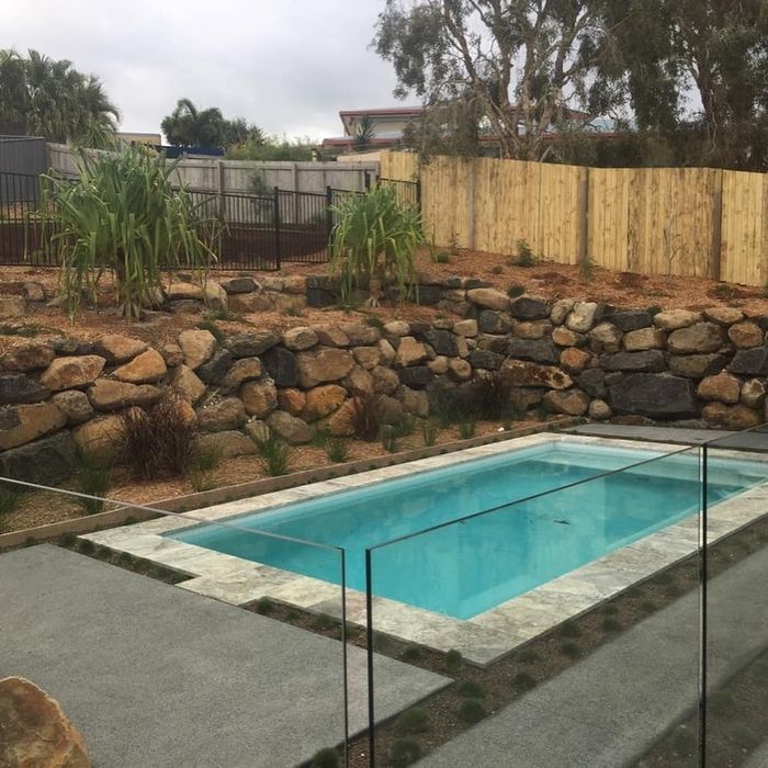 Rock Walls Around A Pool — Retaining Wall Builders in Northern Rivers, NSW