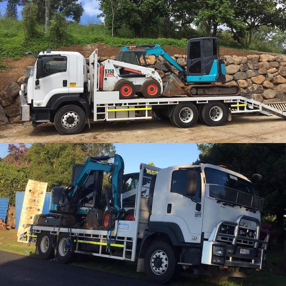 Excavator On A Loader Trucks— Retaining Wall Builders in Northern Rivers, NSW