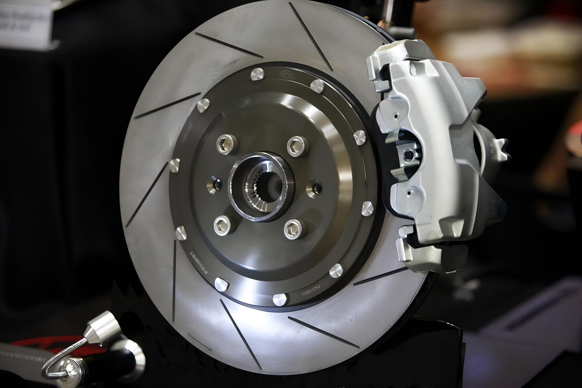 A Close Up of a Brake Disc on a Car — CWC Auto Services In Ainslie, ACT