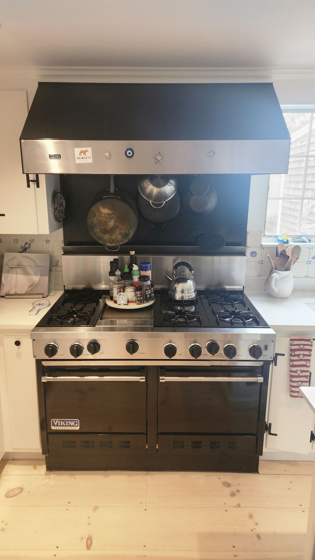 A before and after picture of a wooden deck being cleaned.