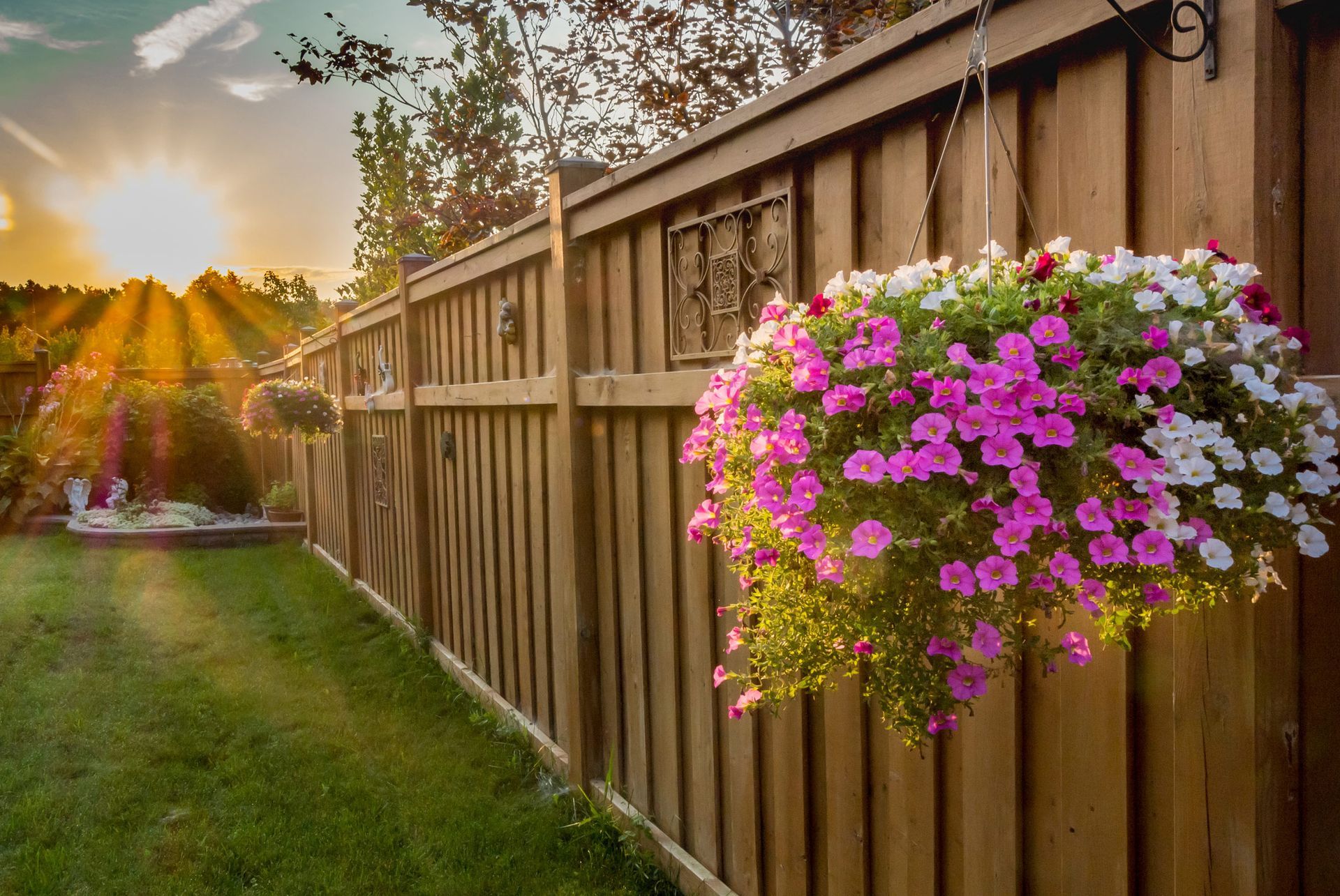 Wooden Fence With a Hanging Basket of Flowers — Clifton, NJ — All Jersey Fence Co.