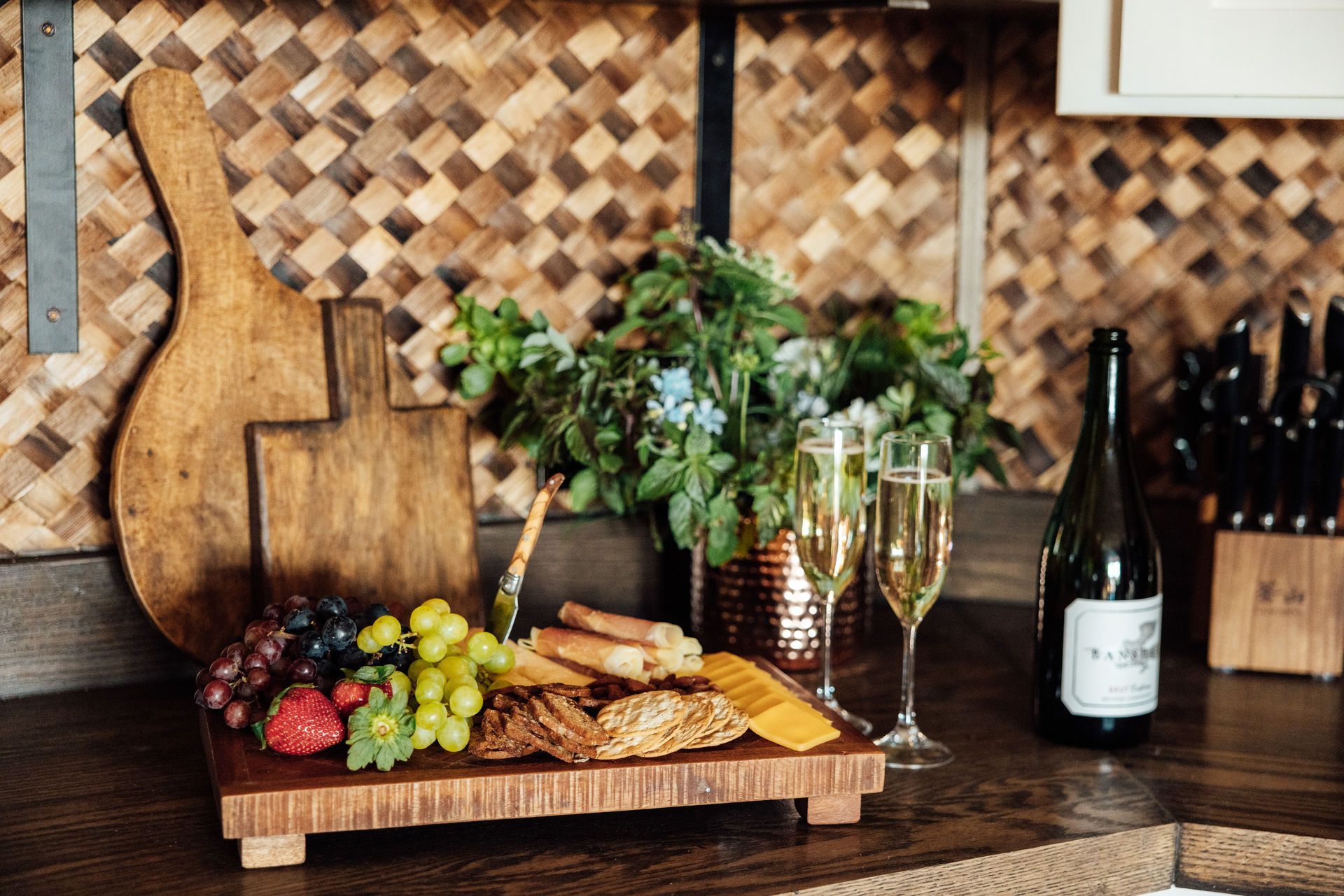 Olive trees in a sunny field, with golden sunlight filtering through the branches and long grass.
