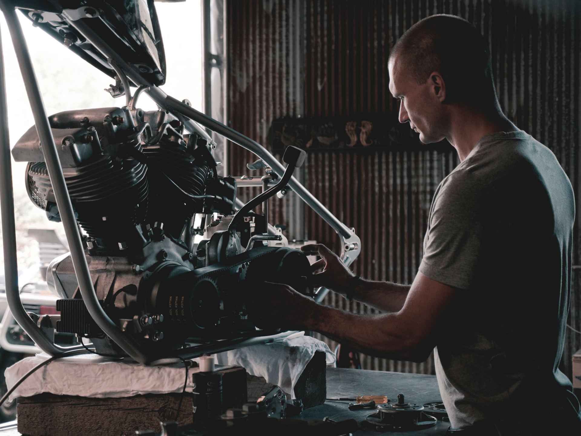 man working on car