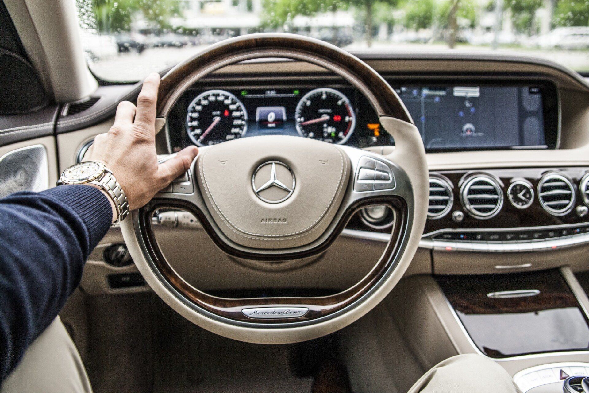 man holding a steering wheel