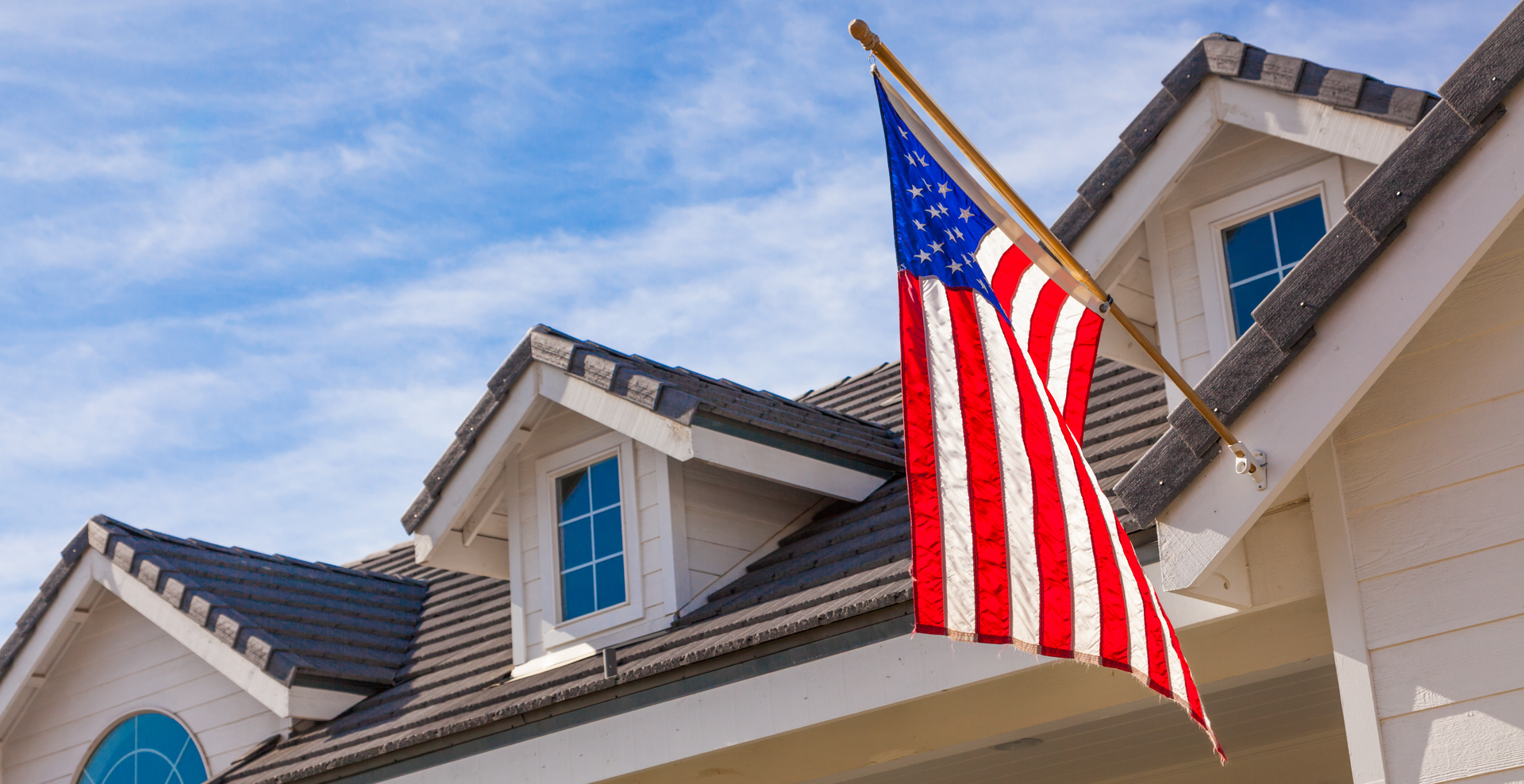 american flag on a roof