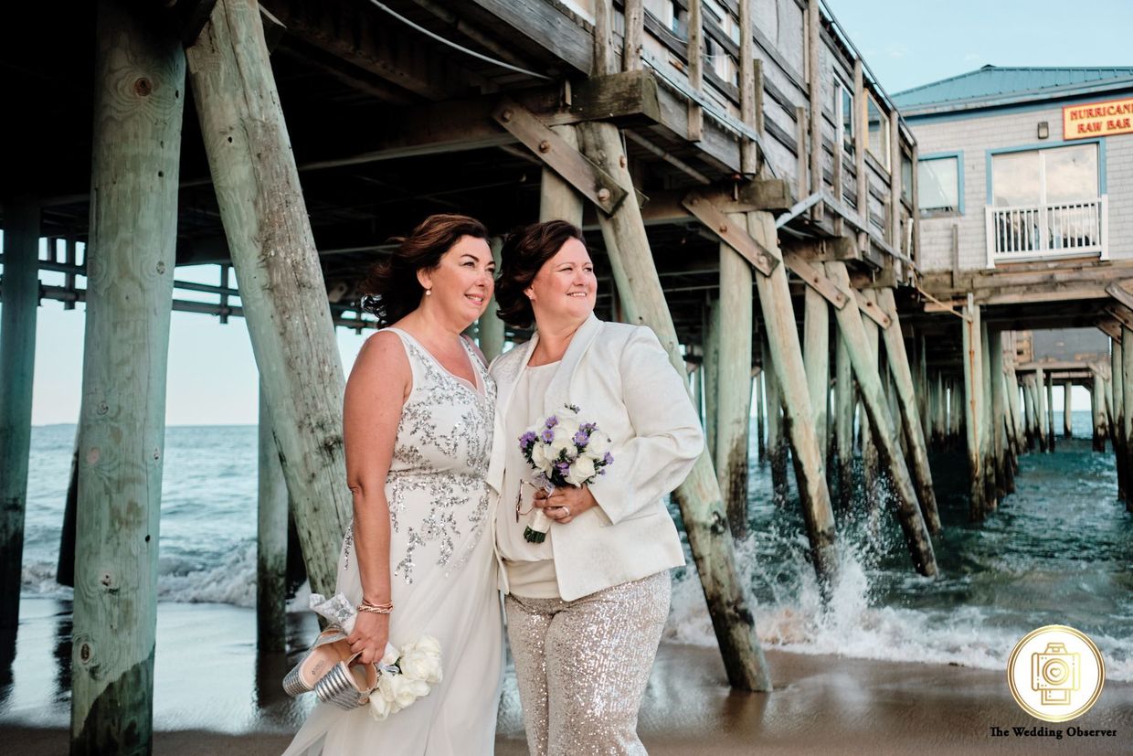Wedding Couple down at the pier at Orchard Beach Maine