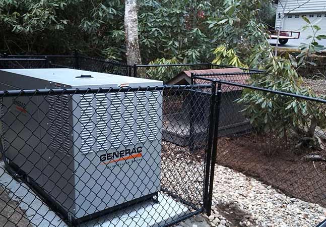 Black Chain Link—Peak Fence System in Franklin, NC