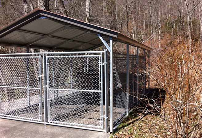 Chain Link Around a Small Storage—Peak Fence System in Franklin, NC