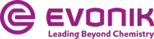 the evonik logo is purple and white and says leading beyond chemistry