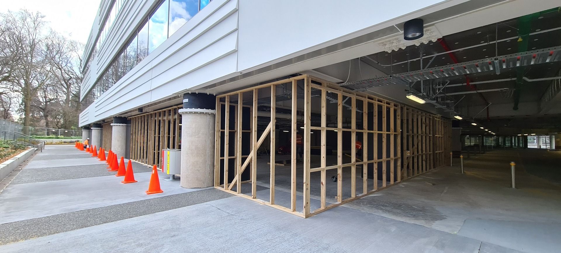 A building under construction with a lot of wooden beams.