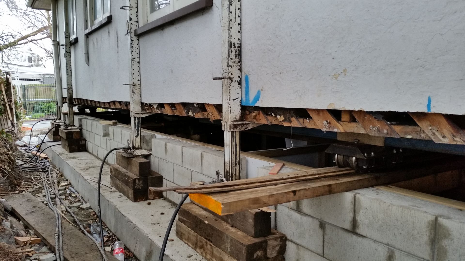 A house is being built on a concrete foundation.