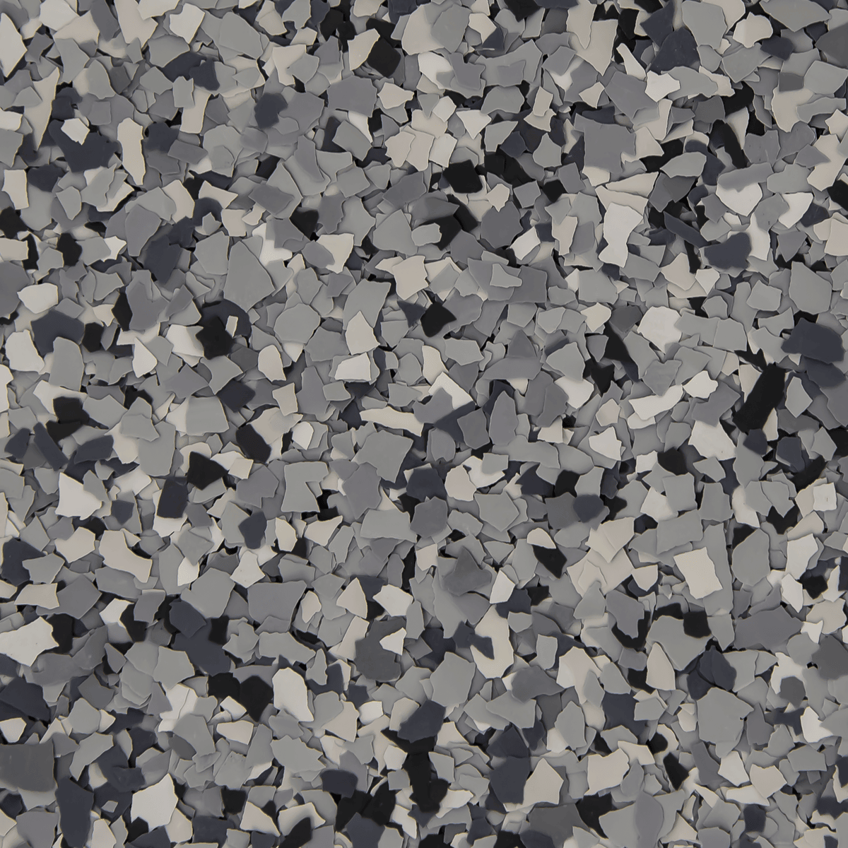 A close up of a gray , white and black marble floor.