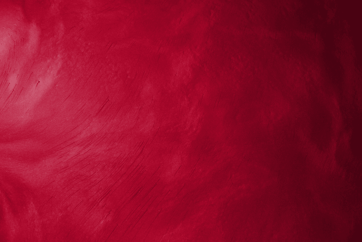 A close up of a red background with a texture.