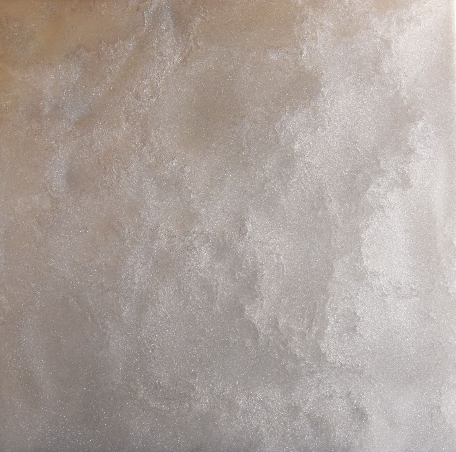 A close up of a gray tile with a marble texture