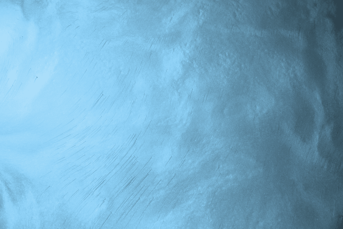 A close up of a blue background with a texture