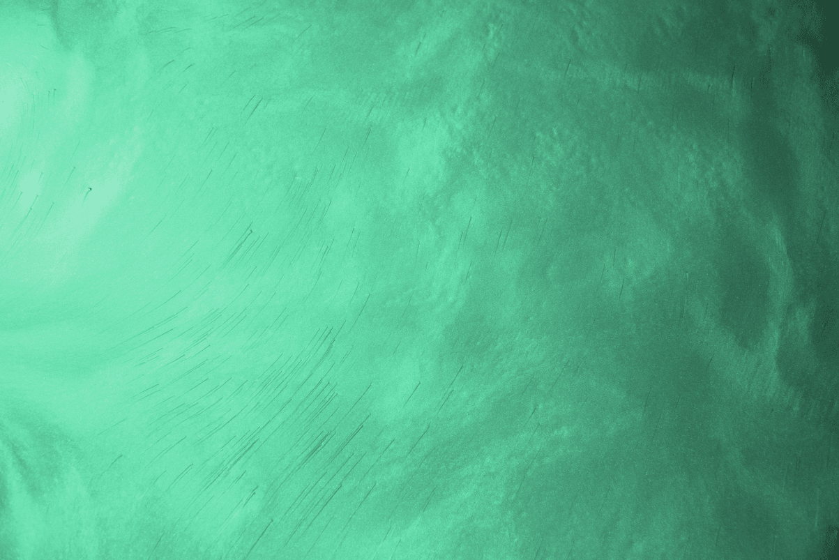 A close up of a green background with a texture.