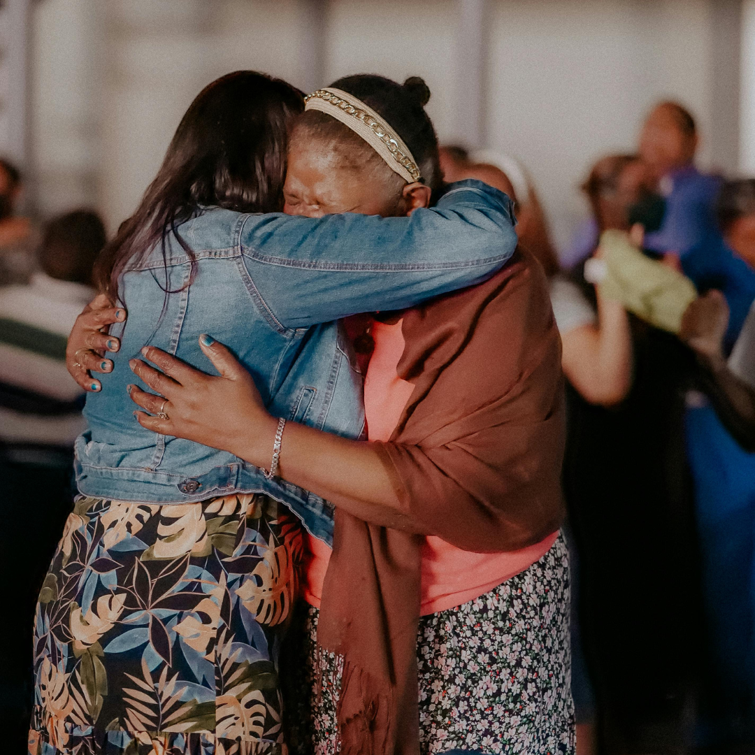 Standing next to US Flag painted on floor representing Asylum grant Orlando Florida