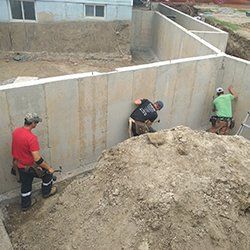 workers busy renovating old house