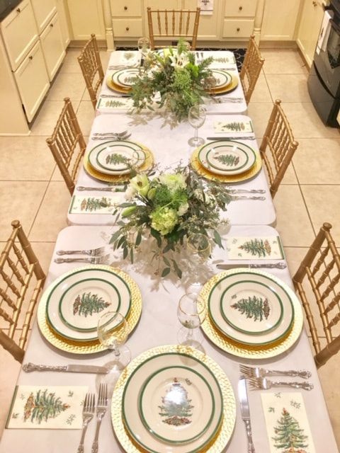 A long table with plates and utensils on it