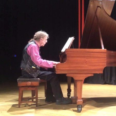 Maurice Memmott on the piano
