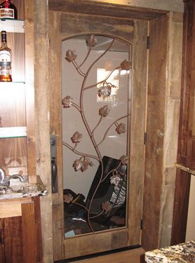 A wooden door with a floral design on it