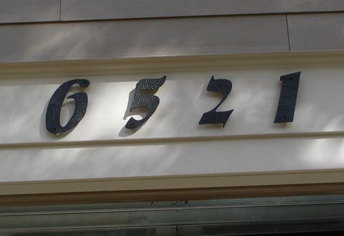 The number 6321 is on the side of a building
