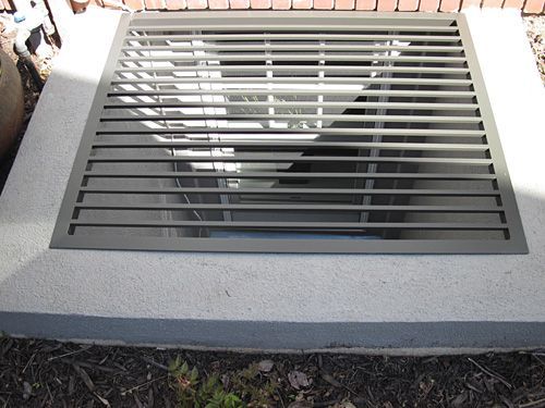 A drain with a metal grille on top of it
