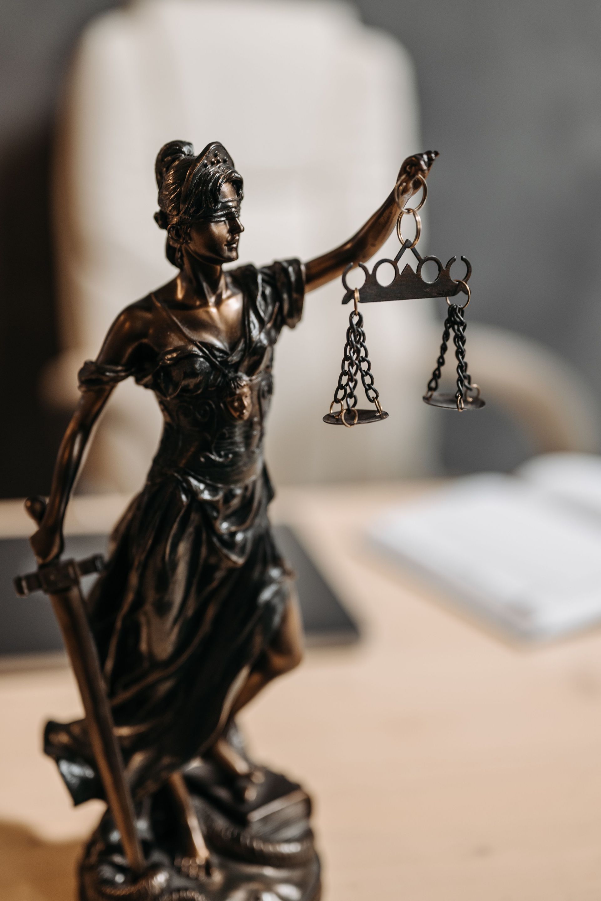 Lady justice statue in a law office representing AI search optimization for law firms