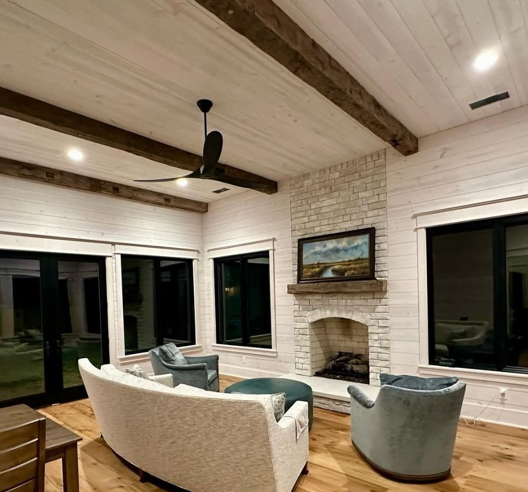 Metal framework for a dropped ceiling in a room under construction, with exposed wiring. Metal framework for a dropped ceiling in a room under construction, with exposed wiring.