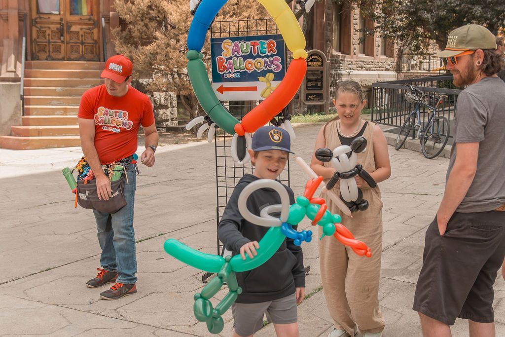 Kid with balloon at the Walking Mall 