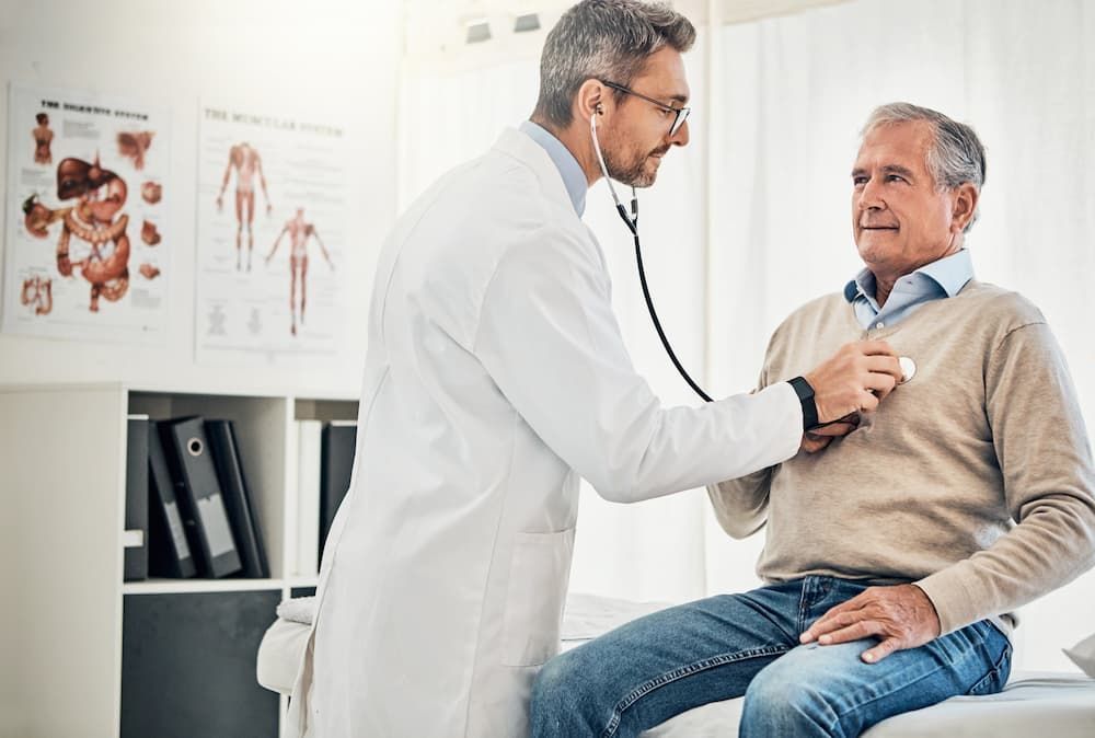 Healthcare professional performing a physical exam, on preventative care or cardiology consultations