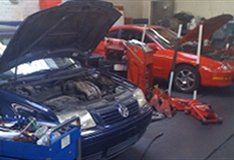 Checking Car Engine on Repair Shop — Pasadena, CA — Vince's Auto Service