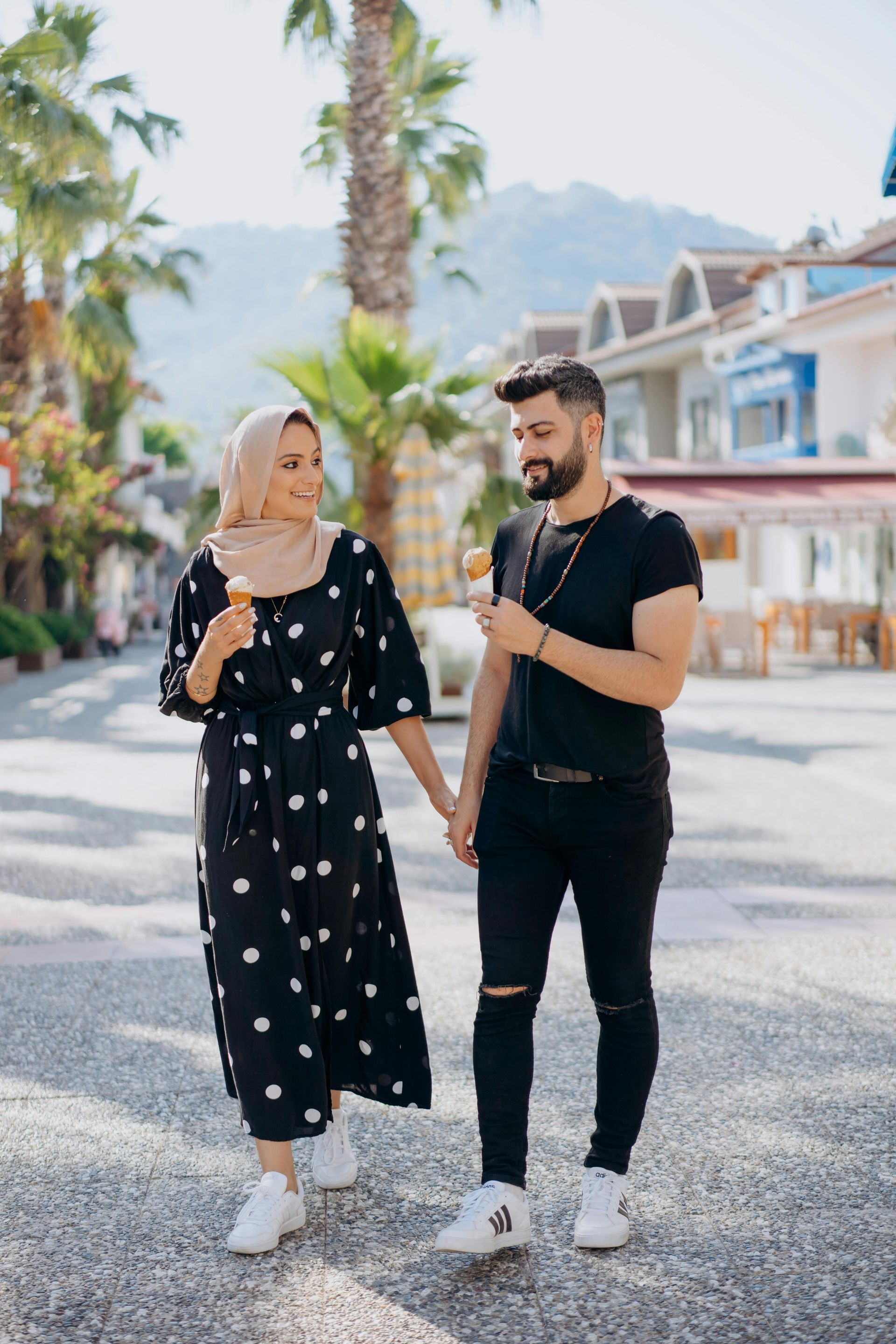 Smiling couple outdoors, representing improved communication from couples counseling.