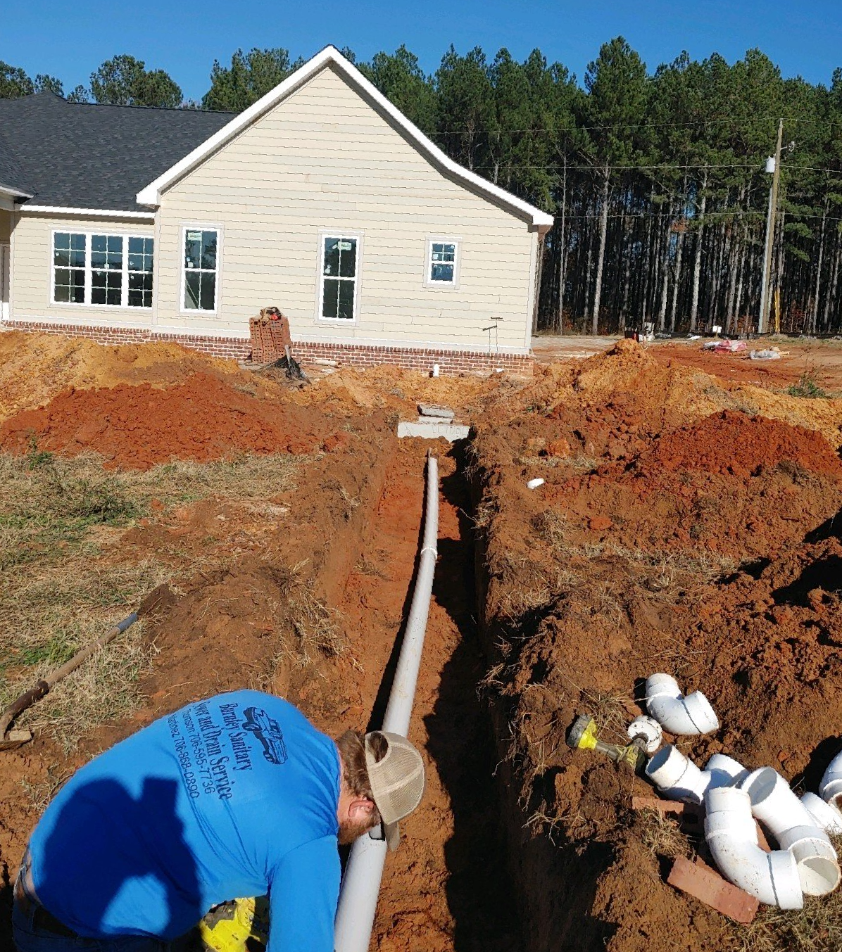 Man working on pipes — Grovetown, GA — Burnley Sanitary Sewer & Drain Service LLC